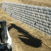 engineered retaining wall (102)